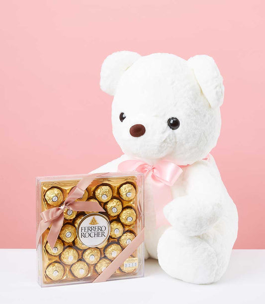 White plush teddy bear with pink satin ribbon and gold-foil Ferrero chocolates gift set for birthdays