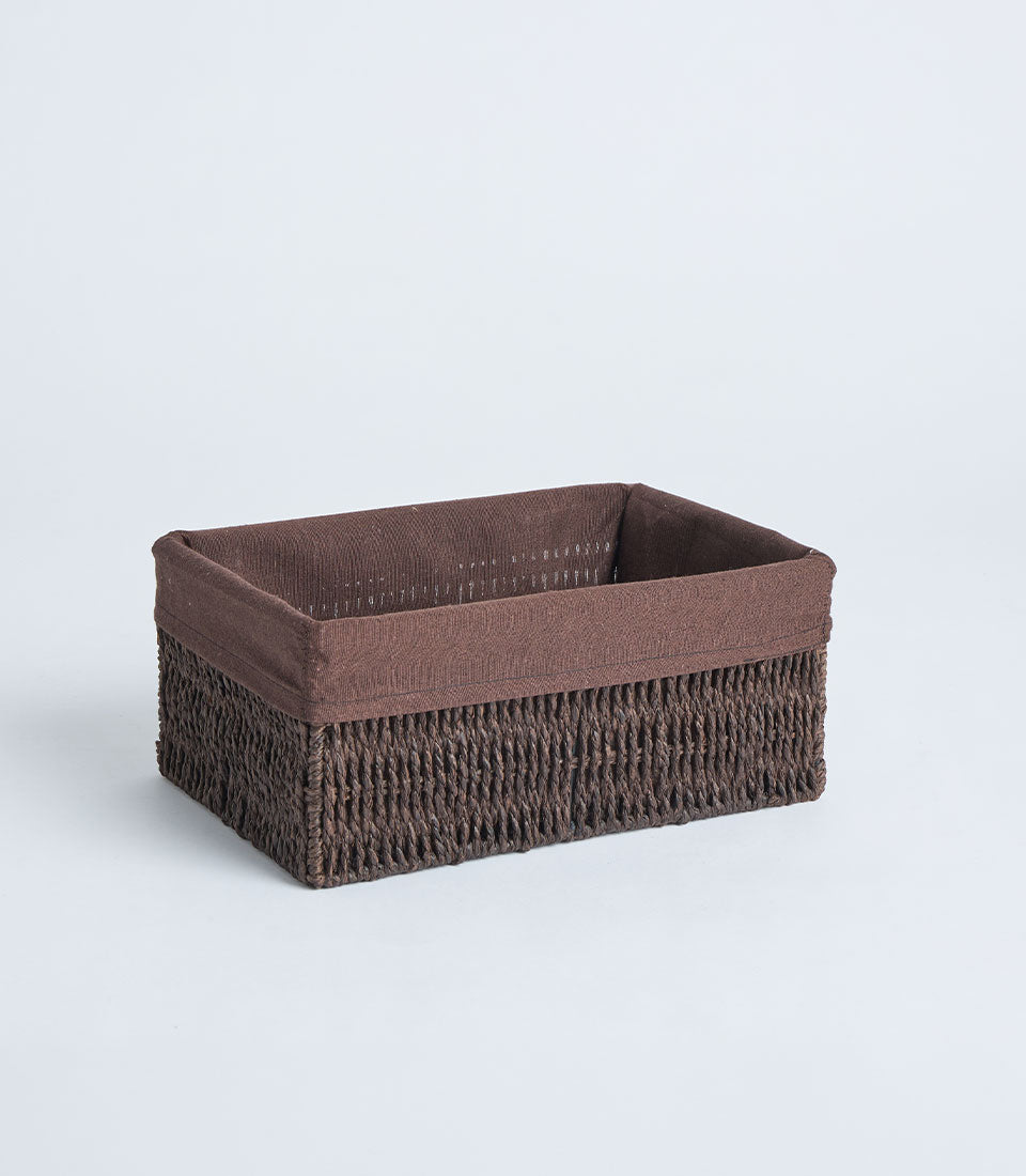 Handwoven rectangular wicker basket with dark brown exterior and fabric lining for luxury gift hampers