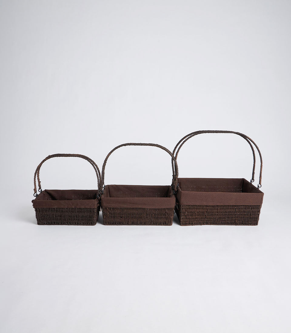 Handwoven dark brown wicker gift baskets with fabric liners and double handles in three sizes