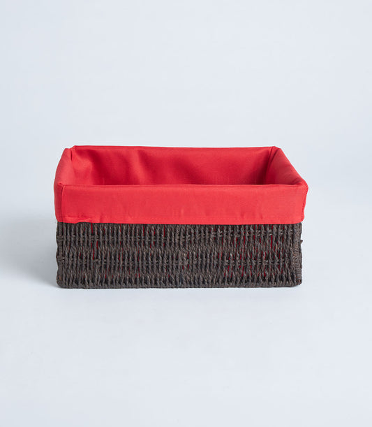 Dark brown woven rattan basket with red fabric lining, artisan handcrafted gift hamper base