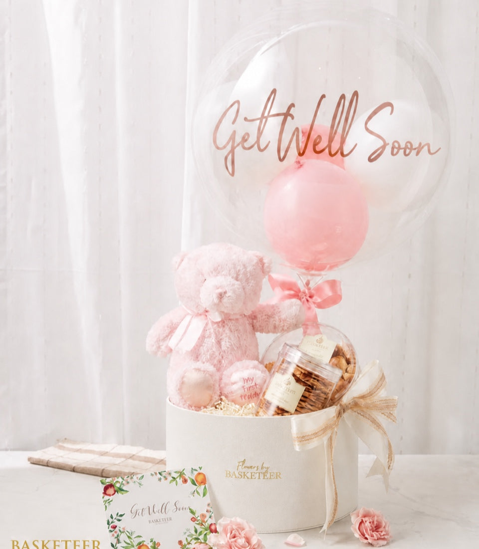 Basketeer luxury get well gift box with a plush pink teddy bear,