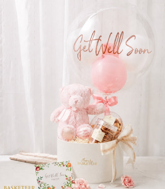 Basketeer luxury get well gift box with a plush pink teddy bear,
