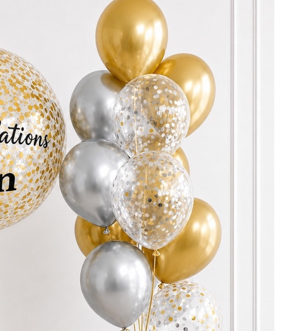 Gold and silver metallic balloons with sequin confetti balloons arranged in a celebratory cluster decoration.