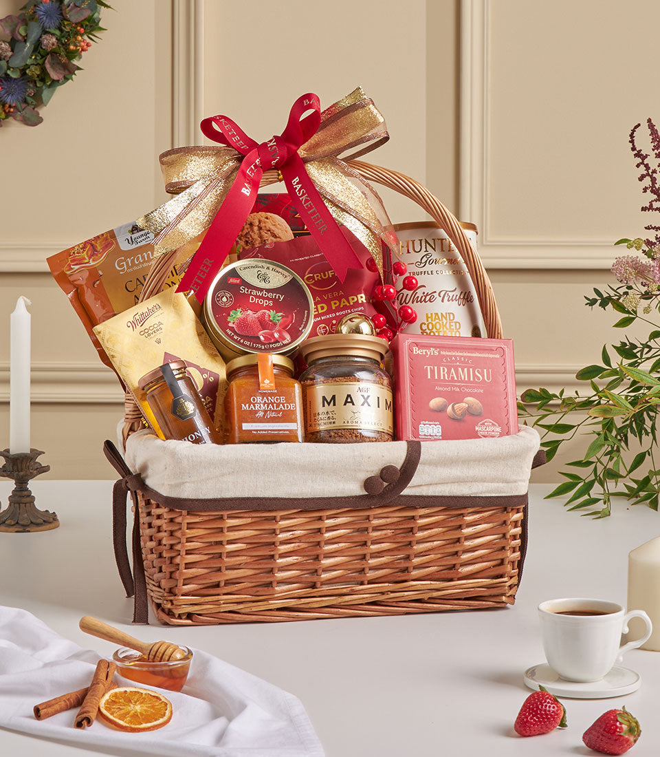 Woven wicker gourmet hamper with Walkers assortment, truffle chips, chocolate, marmalade, and coffee for New Year gifting