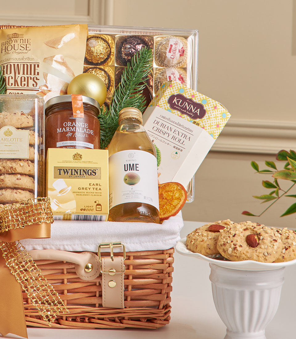 Premium truffle chips, cookies and chocolate New Year gift hamper with wicker basket and gold ribbon