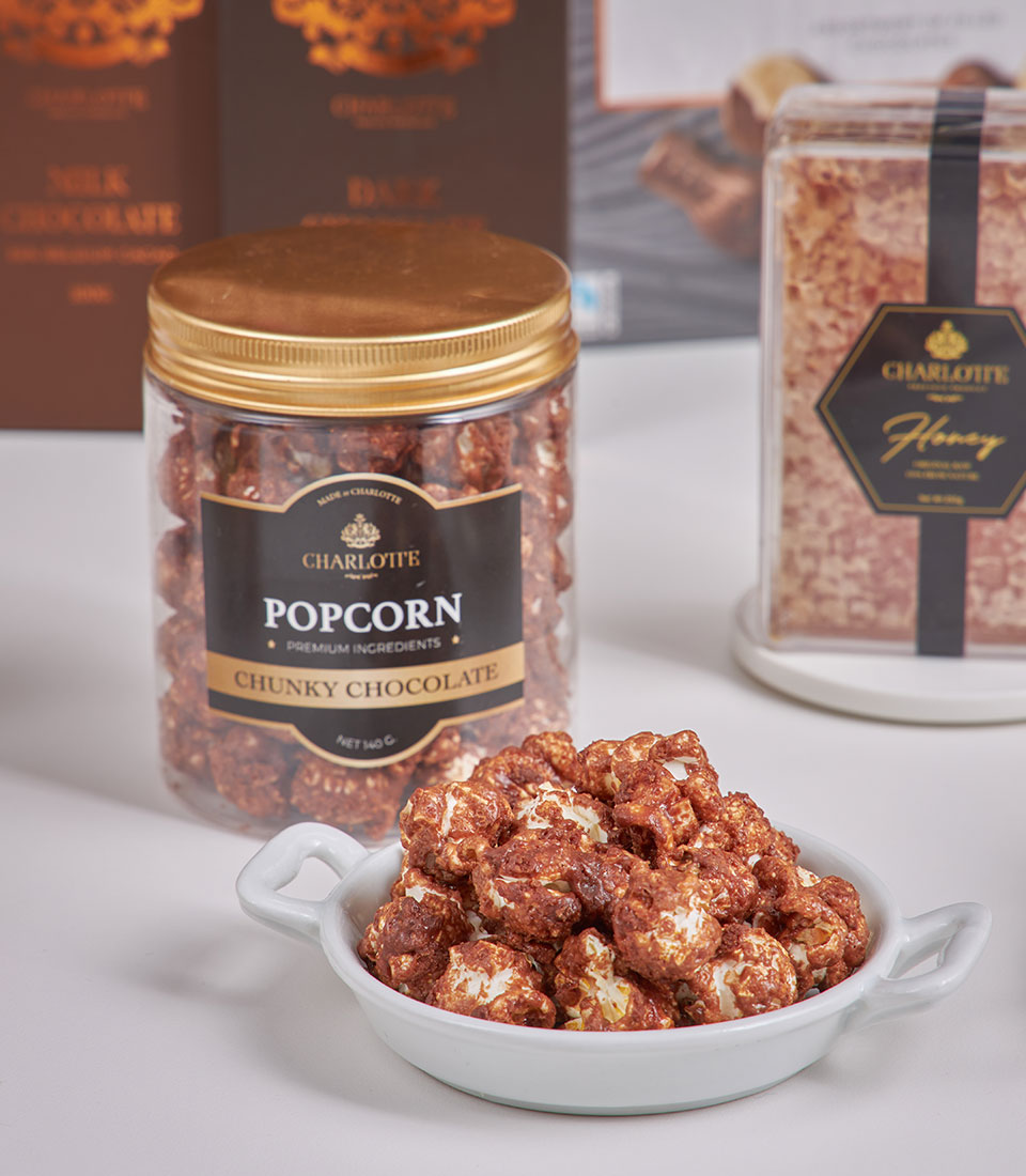 Premium chocolate popcorn, honey, and gourmet treats luxury hamper for New Year celebrations