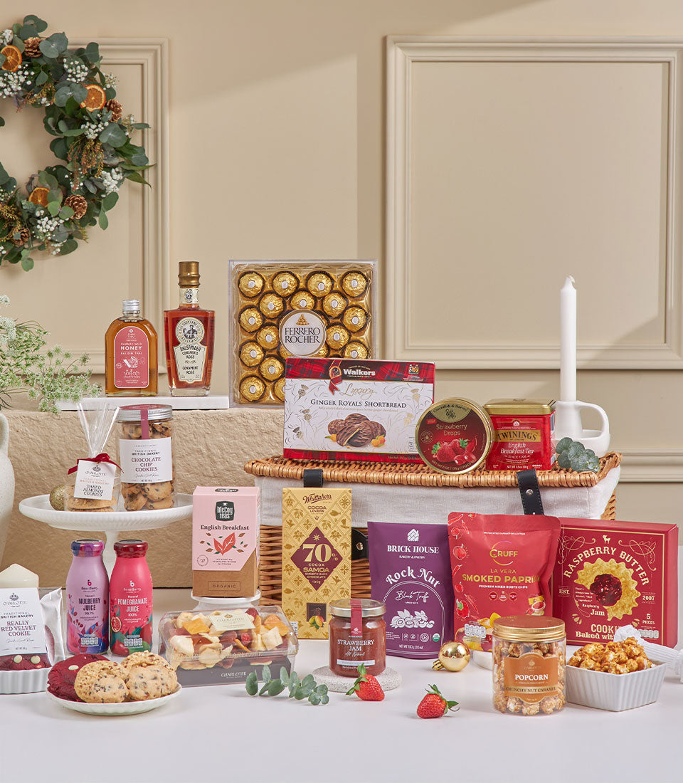 Luxe wicker basket brimming with gourmet chocolates, shortbread, honey, and artisan treats for New Year gifting