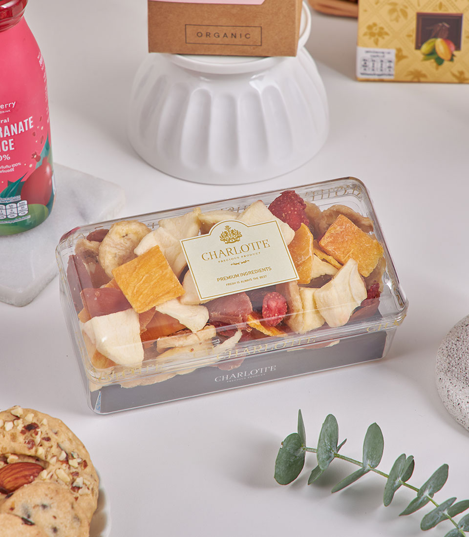 Premium New Year gourmet gift set with dried fruits, pomegranate juice, and artisan treats in luxury hamper