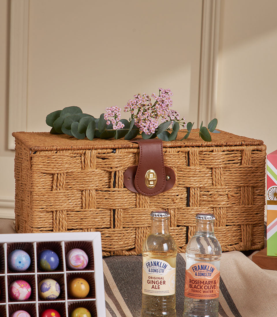 Luxury London & Thai tea chocolate hamper with artisan truffles, gourmet tonics, and eucalyptus for New Year gifting