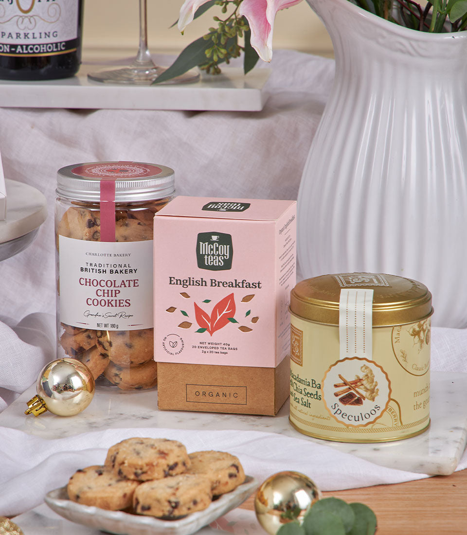 Champagne Style Chocolate Celebration Box with gourmet cookies, tea, speculoos tin, and festive gold accents for New Year