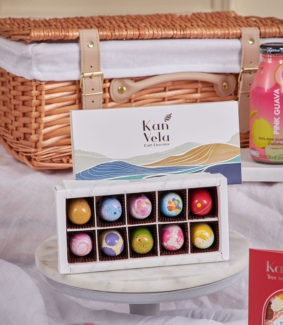 Pink guava and craft chocolate gourmet gift hamper with artisan treats and premium beverages for New Year