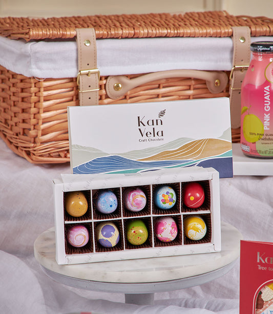 Pink guava and craft chocolate gourmet gift hamper with artisan treats and premium beverages for New Year