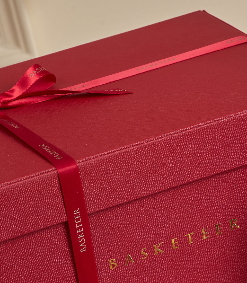 Red velvet luxury gift basket with satin ribbon bow, New Year curated hamper