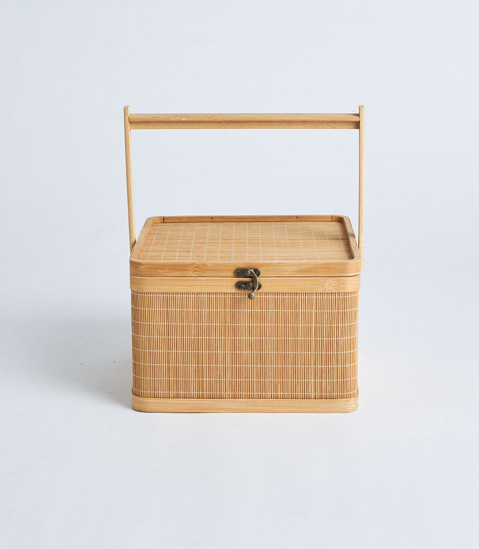 Natural bamboo square basket with woven lid, metal latch and wooden handle for gifting