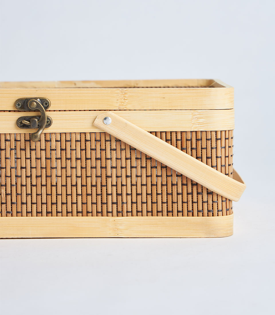 Handwoven rectangular bamboo gift basket with brass clasp and handle