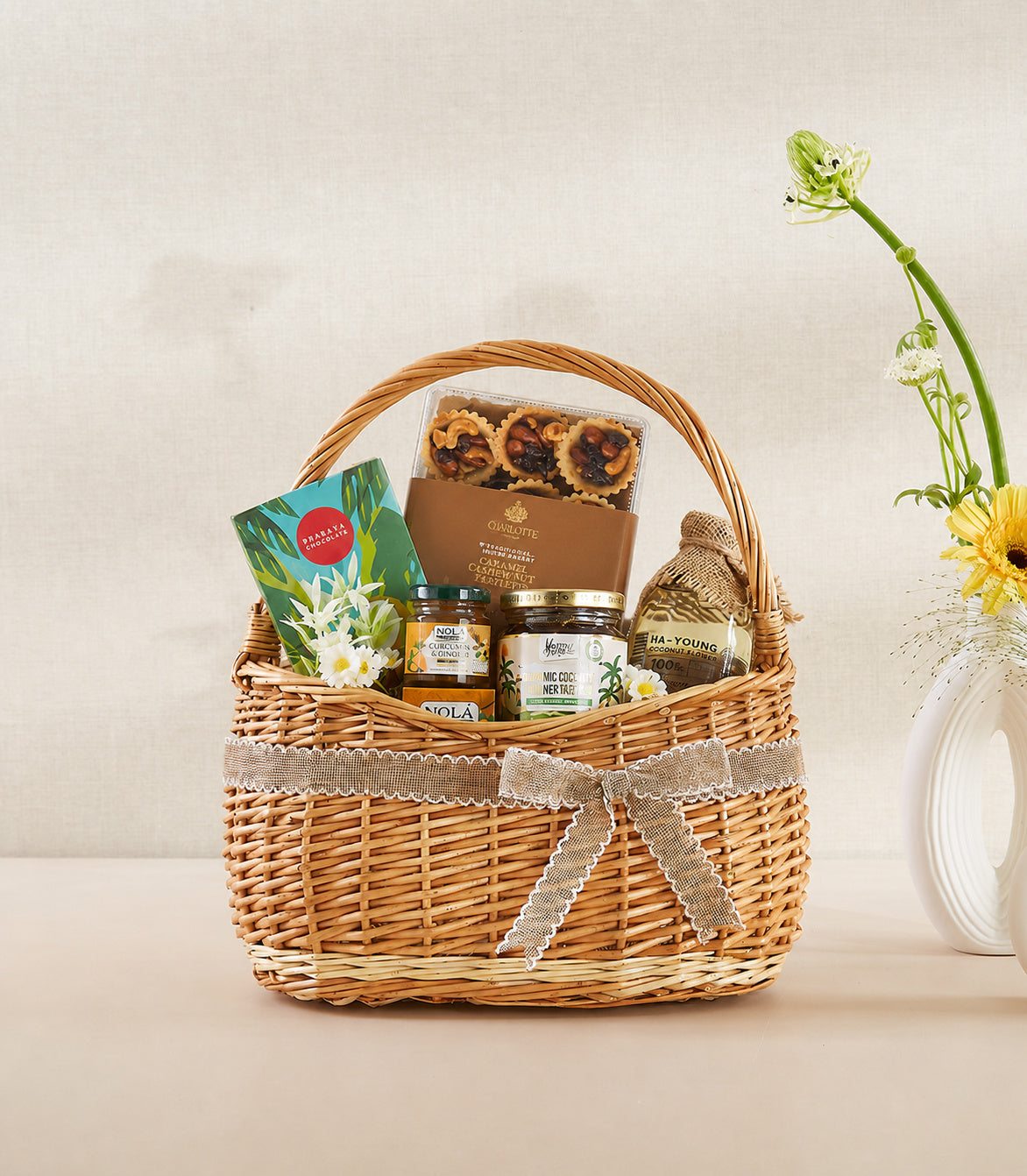 Basketeer's premium hamper, a woven wicker basket with a velvet