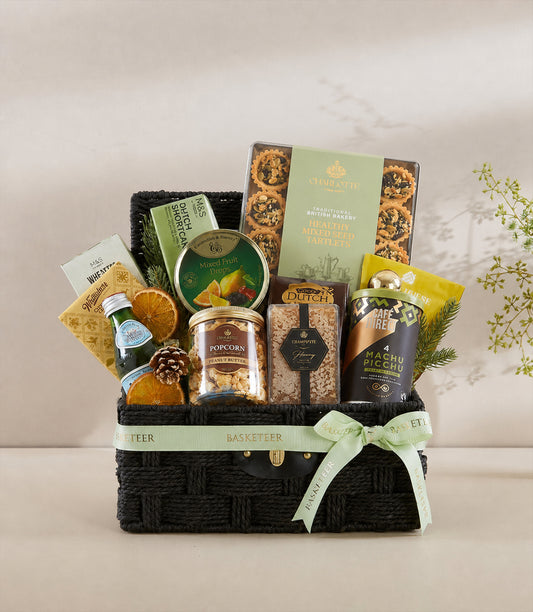 Basketeer luxury gift hamper in a black woven basket with a mint green