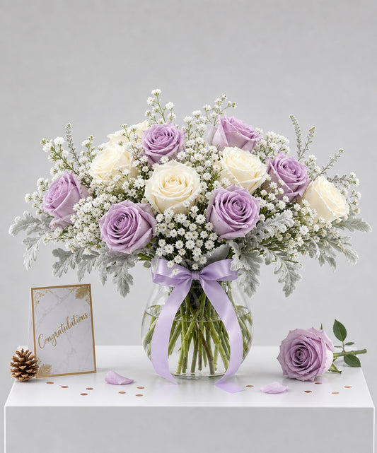 Elegant vase arrangement from Flowers by Basketeer featuring fresh lavender and creamy white
