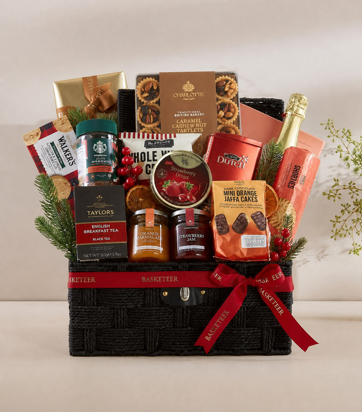 Basketeer luxury gift hamper in a black woven basket, tied