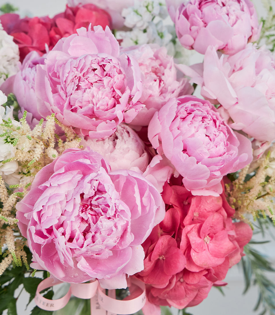 A stunning premium flower arrangement from Flowers by Basketeer, featuring lush