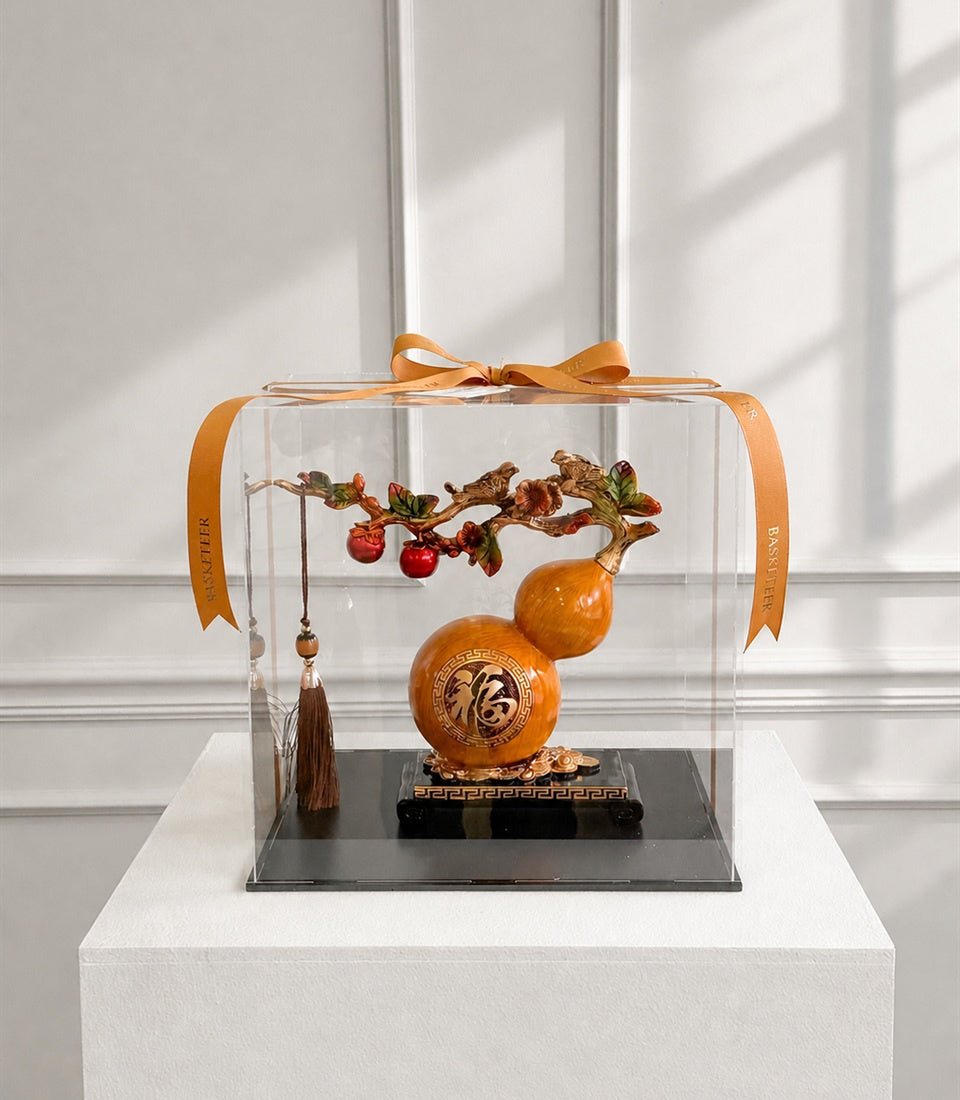 Basketeer luxury corporate gift with a golden Ruyi gourd ornament,