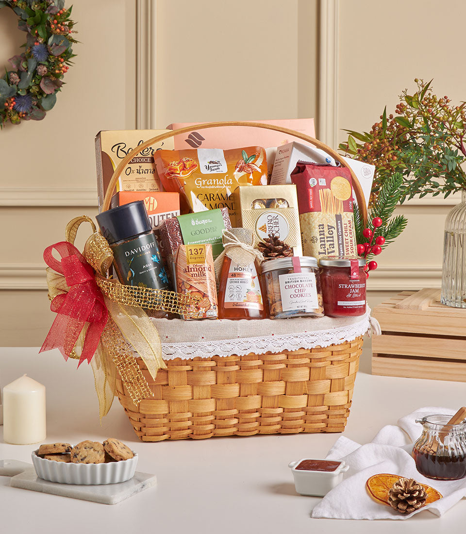 Premium wicker gourmet hamper with almond crackers, chocolate treats, lychee honey, and coffee for New Year gifting