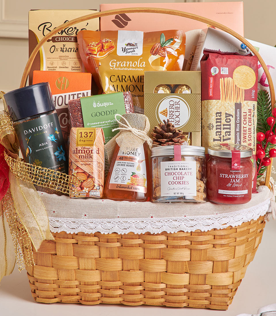 Premium wicker hamper with almond crackers, chocolate treats, lychee honey and gourmet selection for New Year gifting