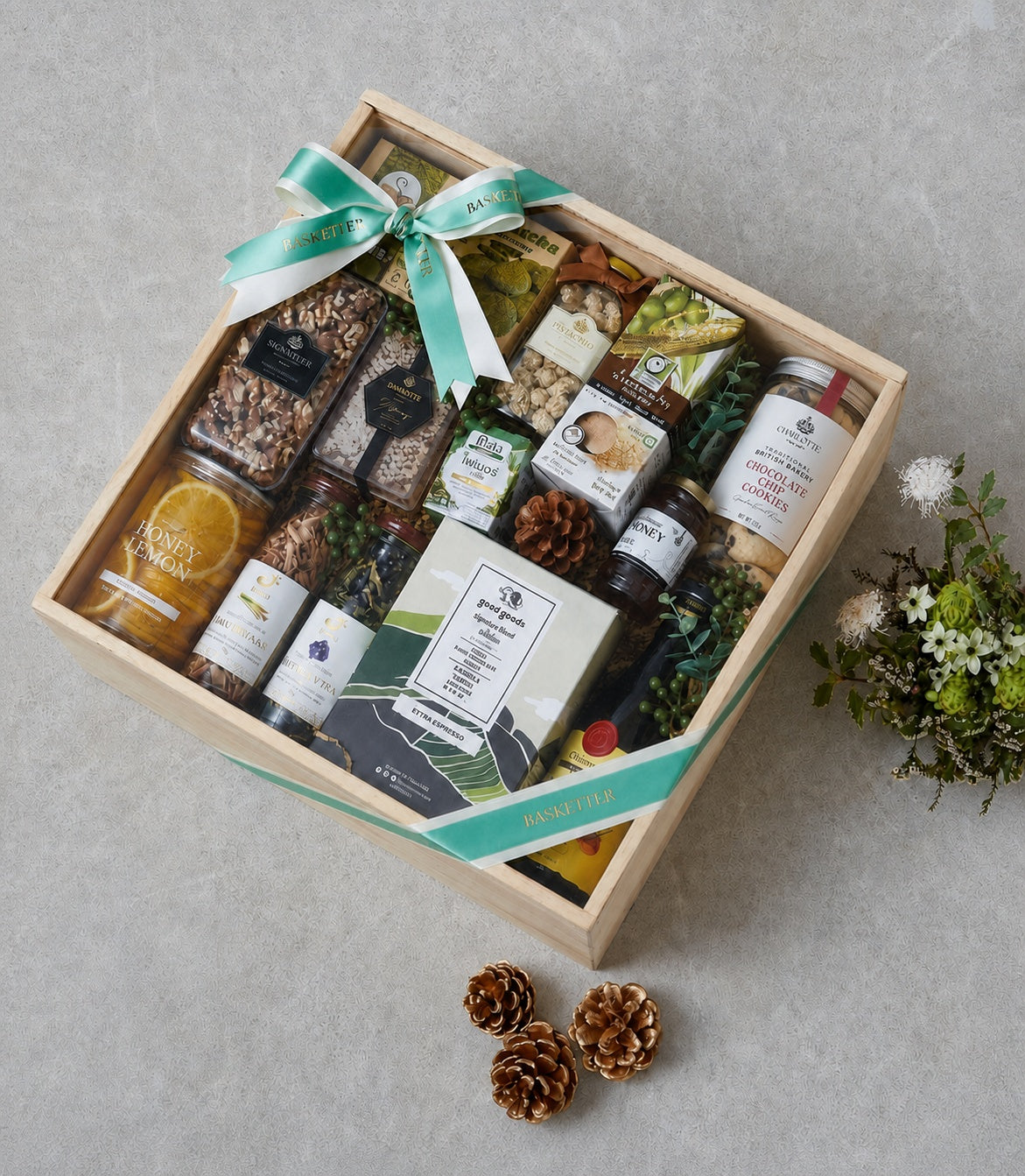 Basketeer premium wooden hamper with walnuts, chocolate chip cookies, honey, and