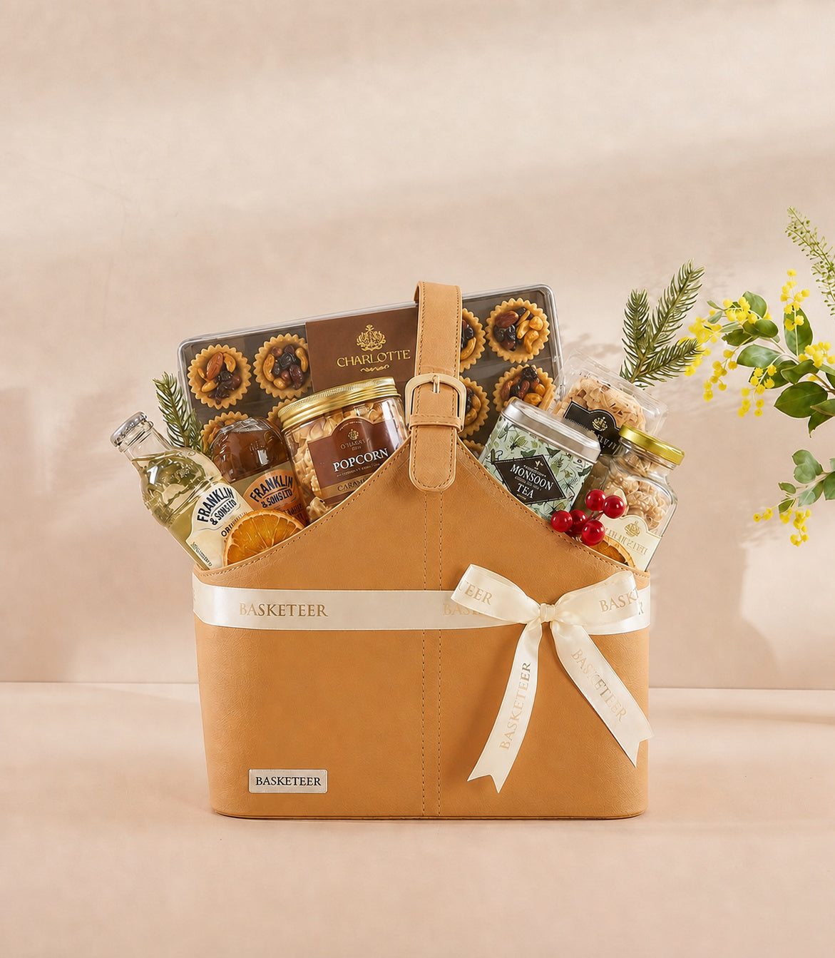 Luxurious Basketeer gift hamper in a tan leather-look tote, filled