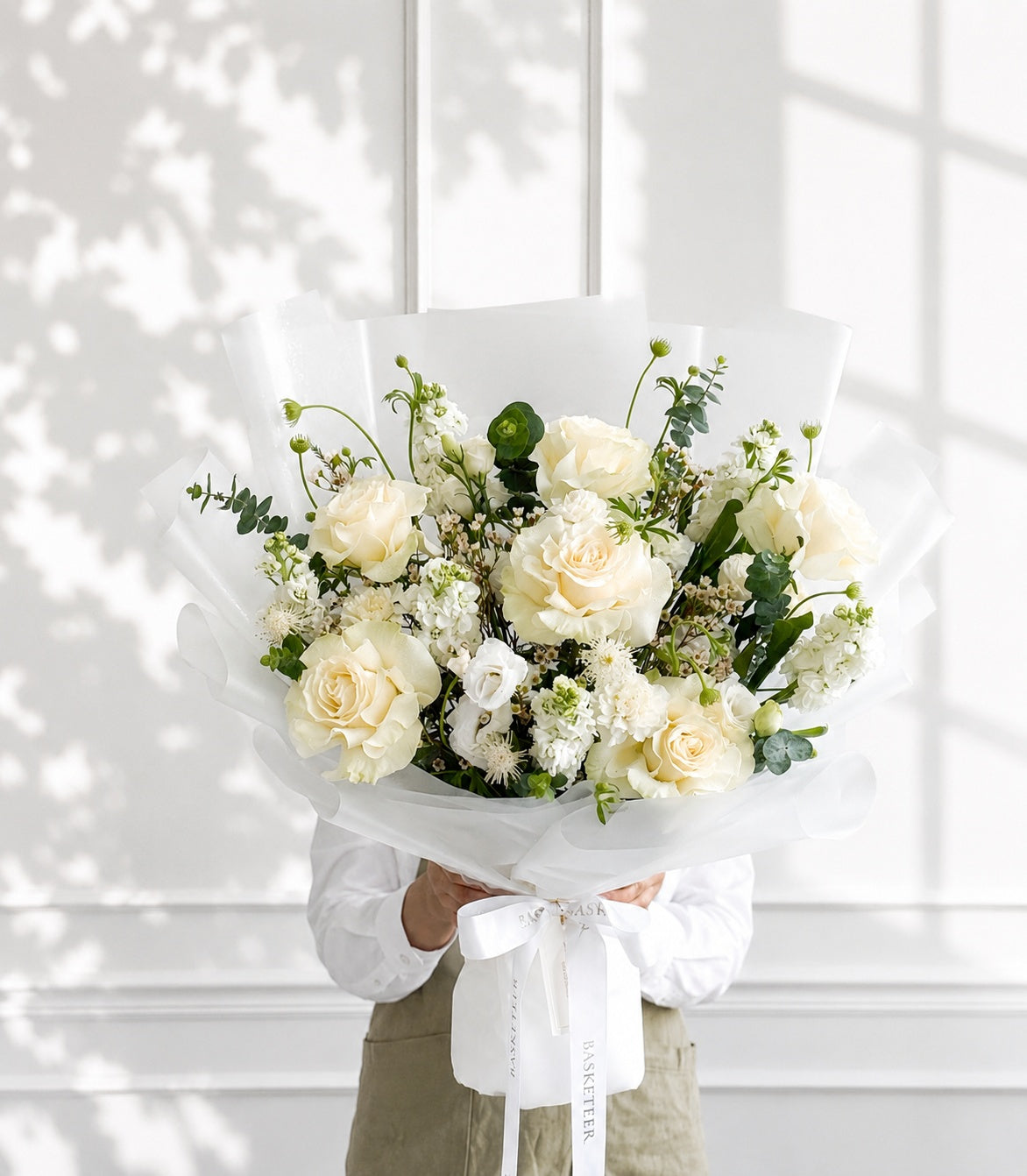 Elegant white rose bouquet by Flowers by Basketeer, featuring premium roses, delicate white