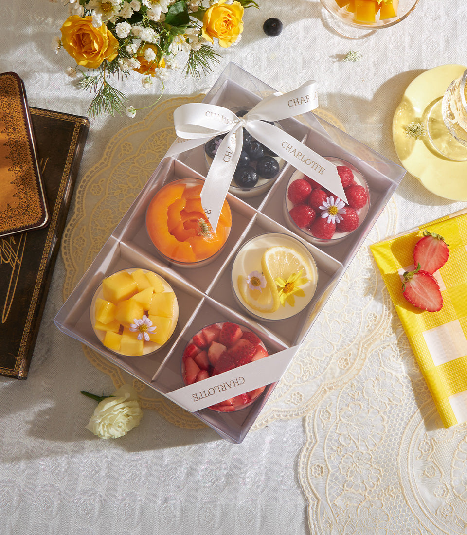 Mini cheesecake cups with Biscoff base and assorted fresh fruit toppings in gift box