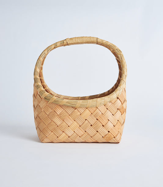 Handcrafted natural bamboo oval basket with woven wide handle