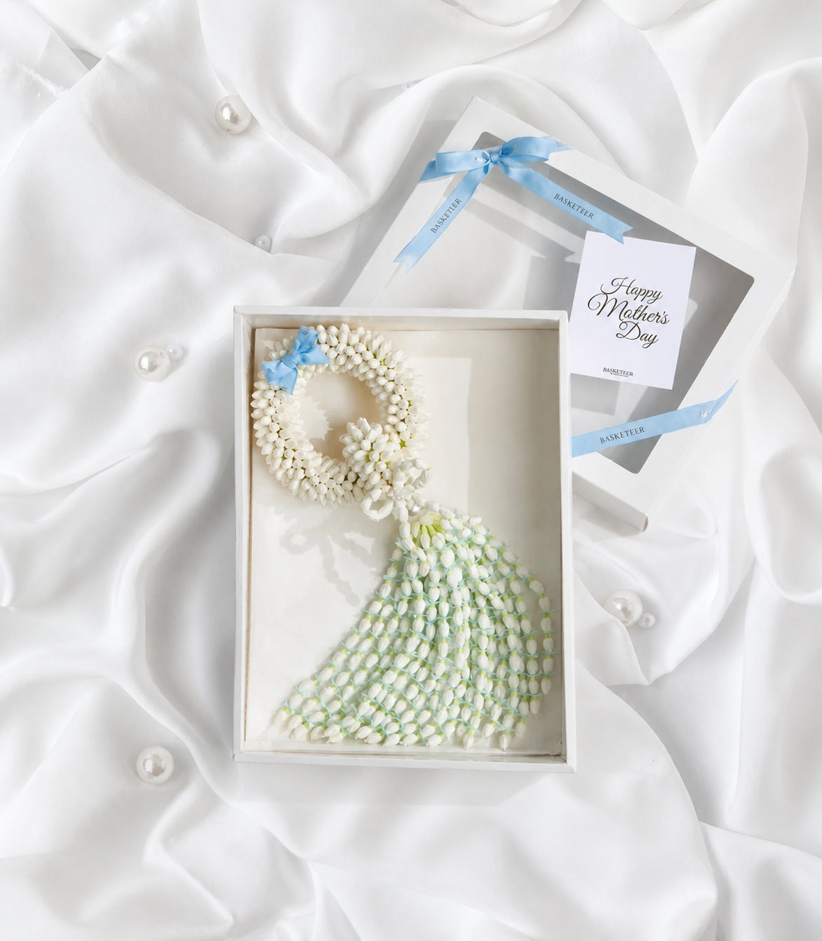 Basketeer luxury Mother's Day gift featuring a fragrant jasmine garland in