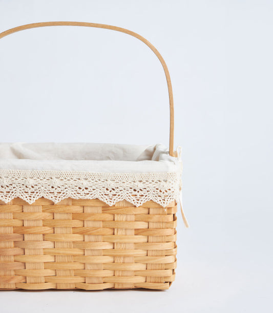 Basketeer's charming handwoven wicker basket with sturdy wooden handle