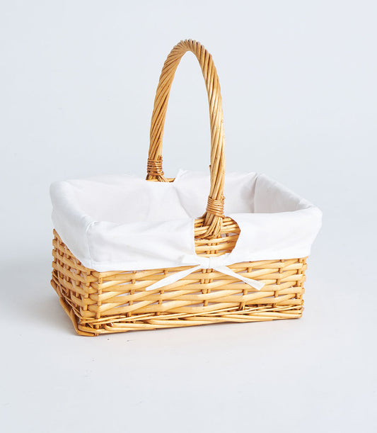 Basketeer's elegant handwoven wicker basket with sturdy handle and crisp