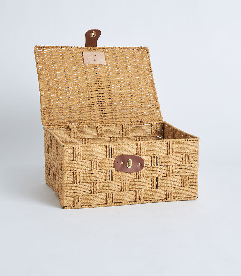 Natural woven storage basket with hinged lid and leather lock closure