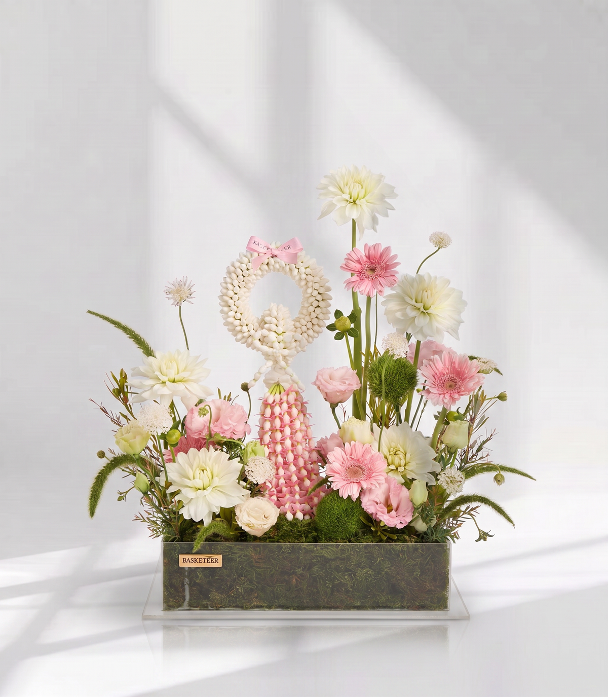 Basketeer's luxurious gift box features a traditional jasmine garland with a