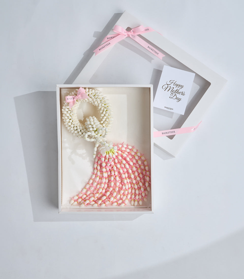 Elegant Mother's Day gift set featuring a white pearl beaded wreath, pink pearl beaded dress form, greeting card, and pink ribbon bow in luxury white packaging.