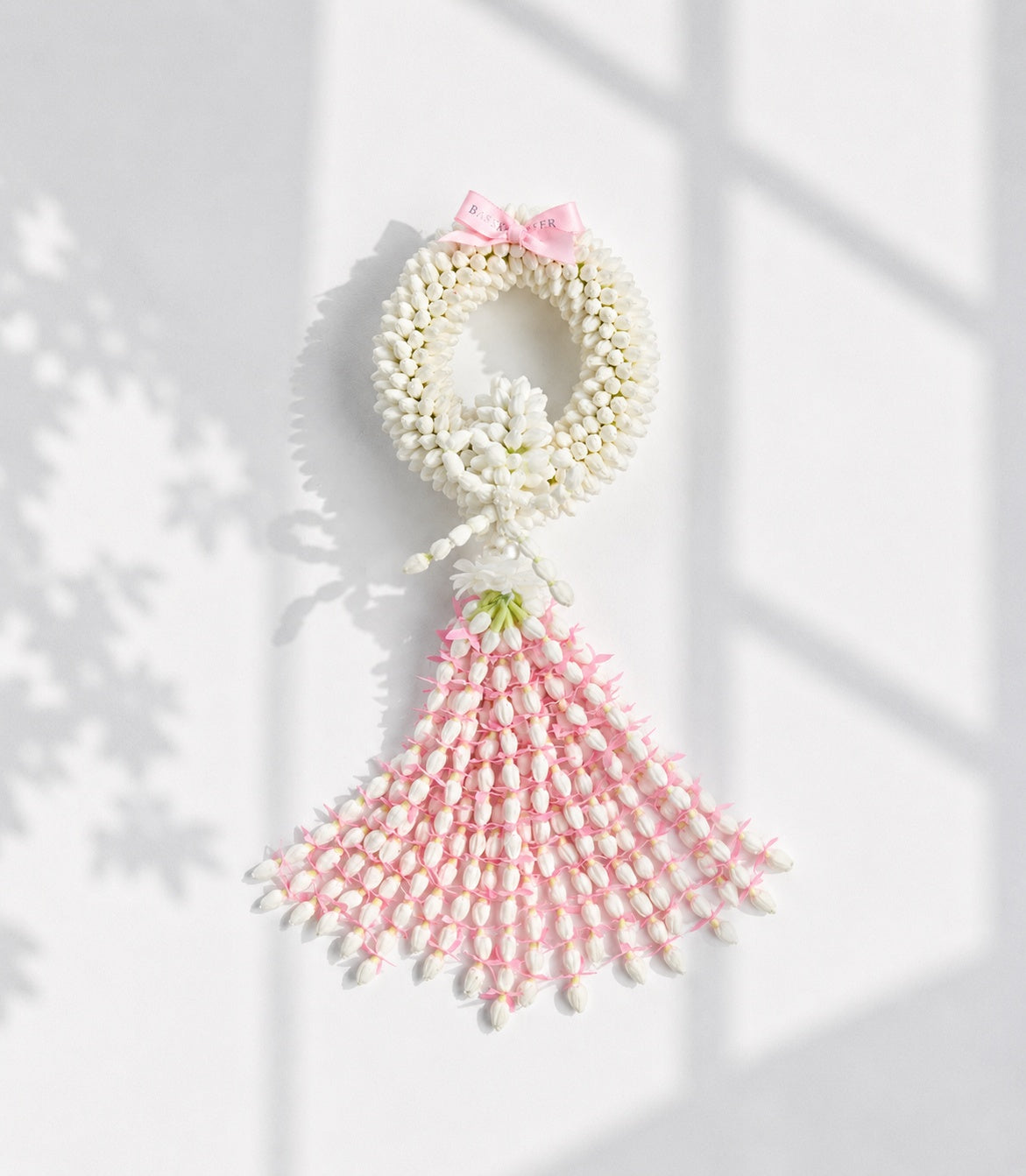 Basketeer presents a beautiful jasmine garland, an elegant gift with