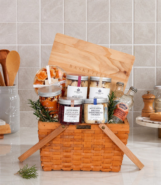 Basketeer luxury gift hamper with a woven wooden basket, featuring a "B