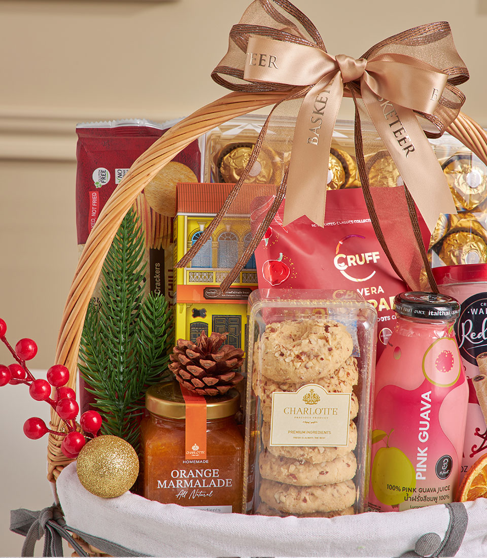Premium spiced guava and chocolate New Year gift basket with wicker weave, satin ribbon, and festive decorations