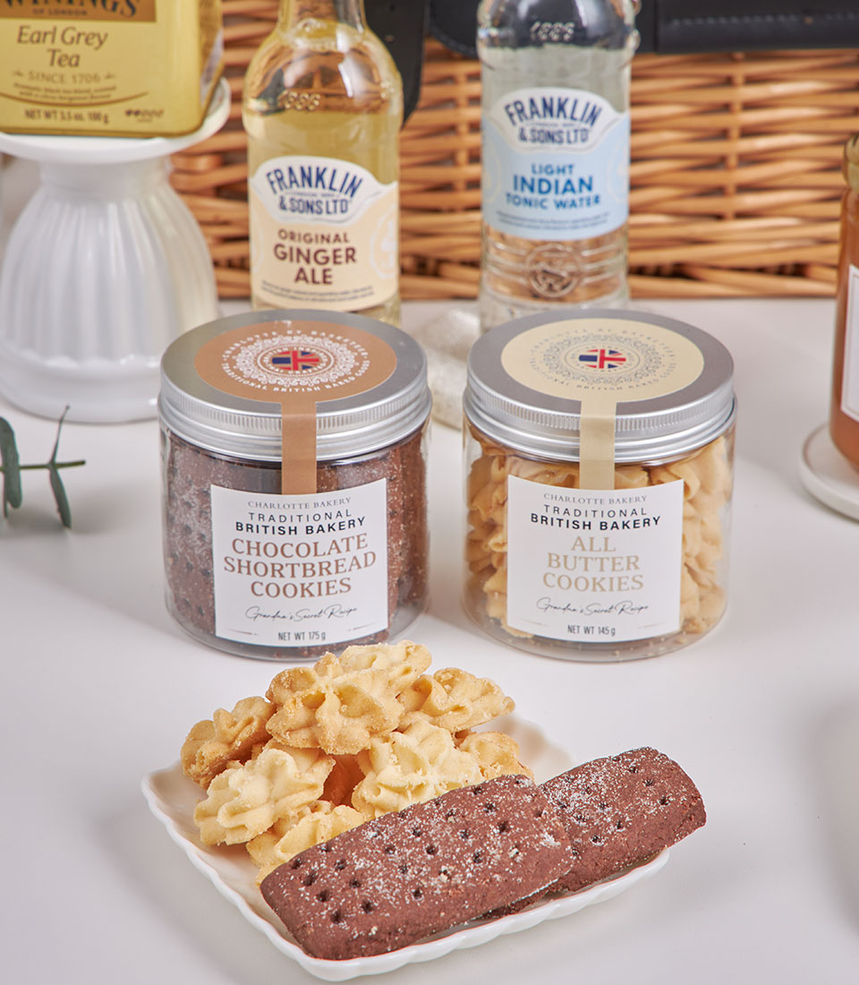 Grand Festive hamper with Charlotte Bakery shortbread cookies, ginger ale, tonic water, and Earl Grey tea for New Year