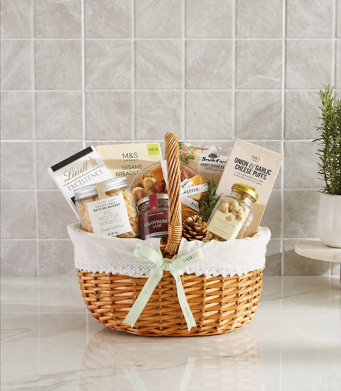 Basketeer luxury gift basket with wicker weave, white liner, and mint ribbon