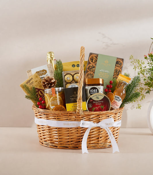 Basketeer luxury gift basket with a woven wicker hamper, adorned with