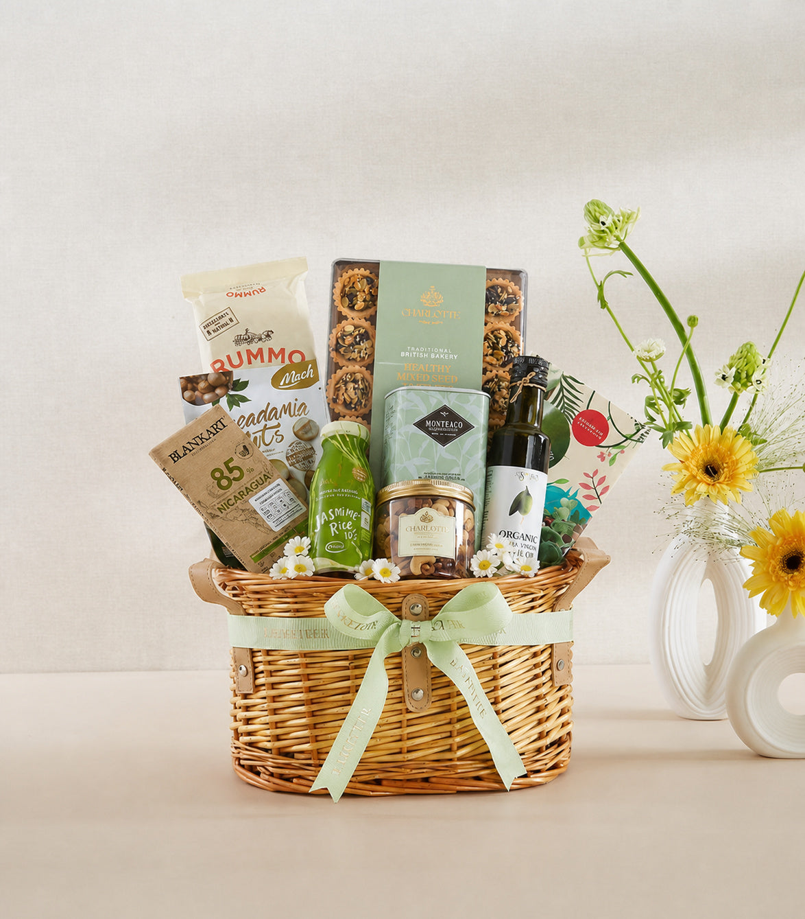 Basketeer luxury gift basket with premium macadamia nuts, gourmet biscuits, and