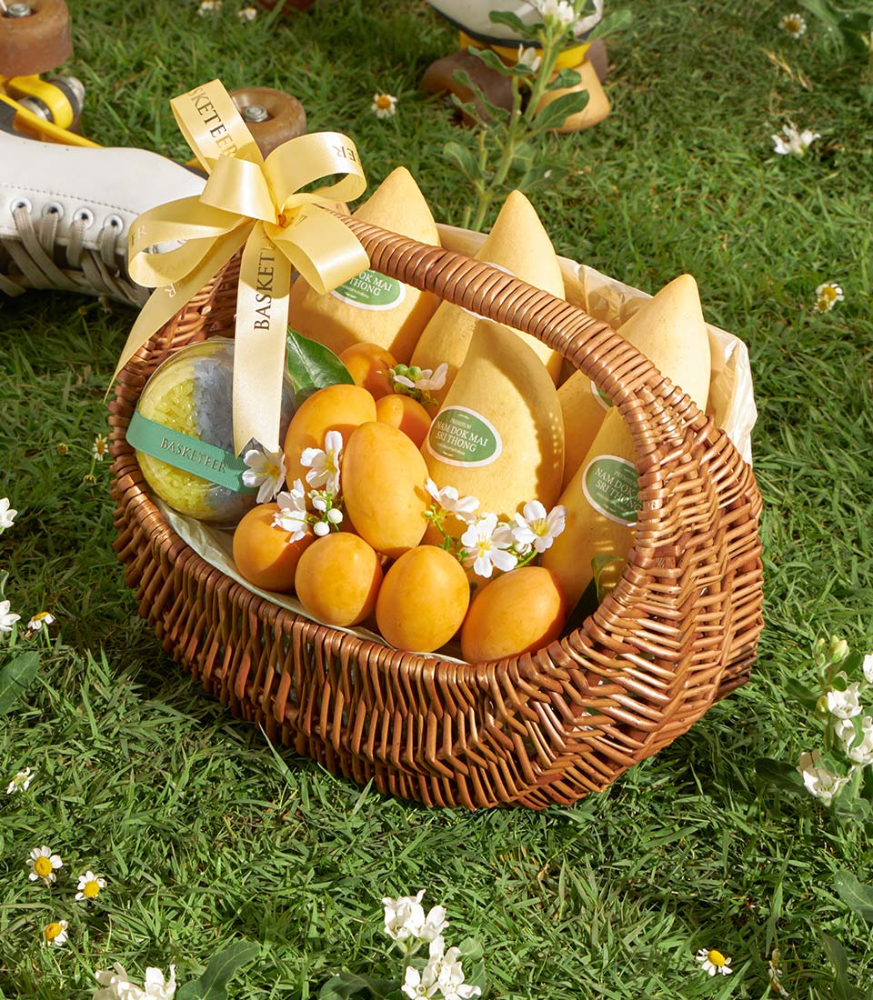 Premium Thai mango and mayongchid fruit basket with sticky rice, handcrafted by Basketeer