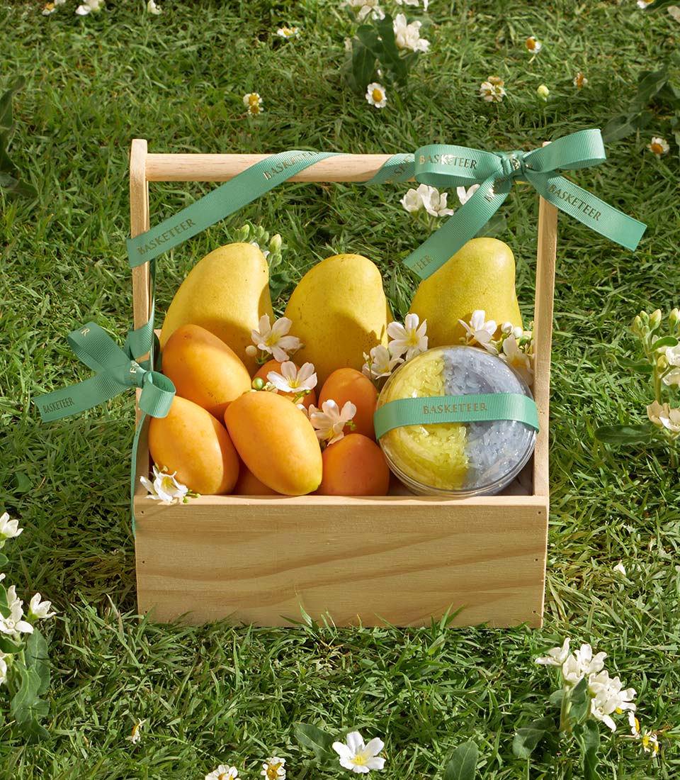 Premium wooden gift box with fresh mangoes, mayongchid orchids, and sticky rice delicacy