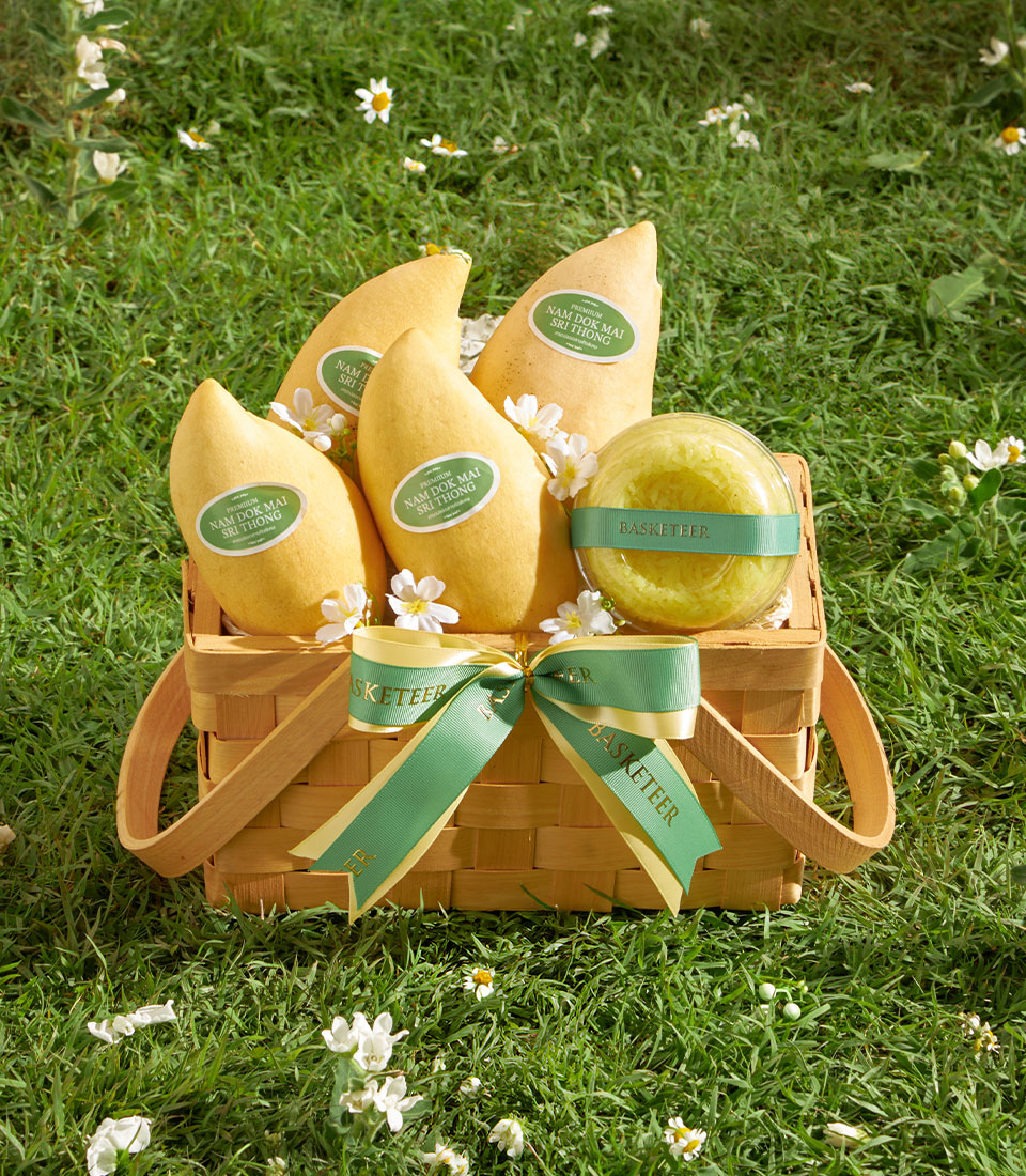 Premium Nam Dok Mai mango gift basket with sticky rice, woven wood basket with green and gold Basketeer ribbon