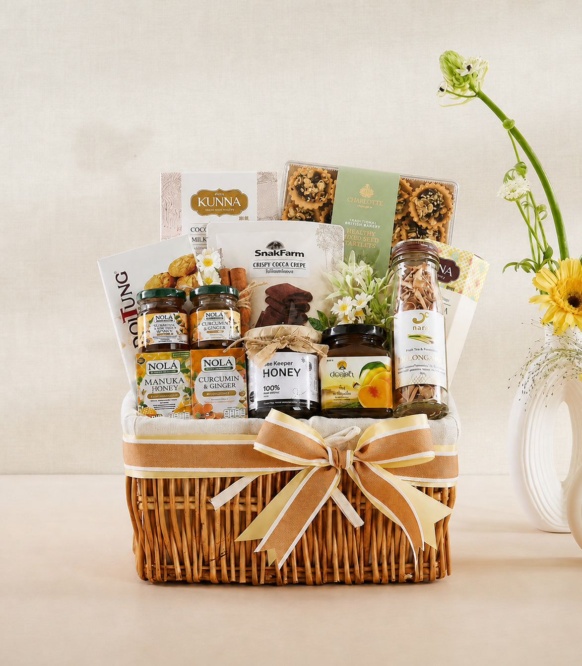 Basketeer luxury gift basket with golden honey, healthy spreads, and gourmet