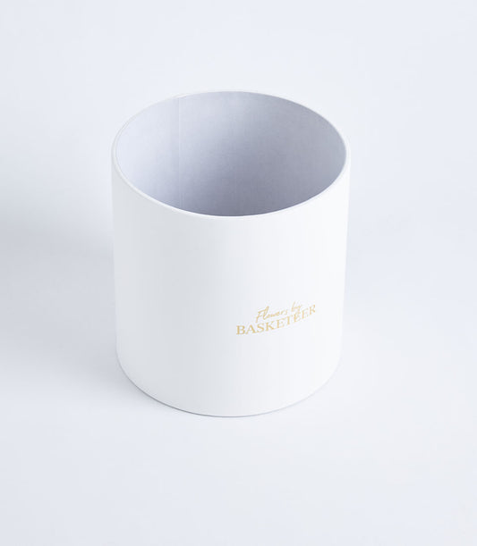 Basketeer's premium round mist grey gift box, featuring elegant